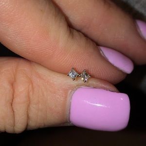 Minimalist princess cut natural diamond earrings in 14k yellow gold.